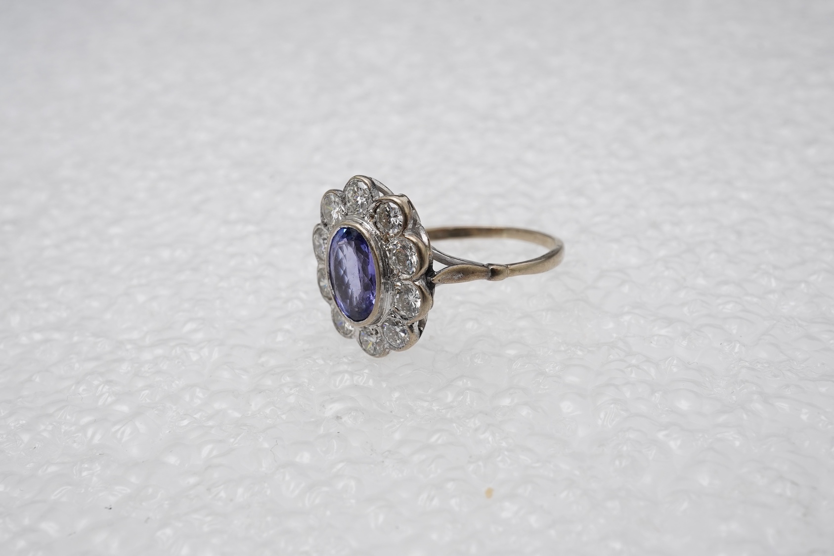 A tanzanite and diamond ring